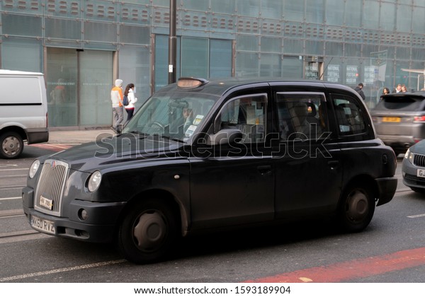 Black\
Manchester Taxi At Manchester England\
2019