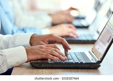 Black Man's Hands Typing On Laptop. Brown Male Hands Pressing Buttons On Laptop Computers.