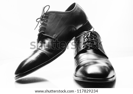  The black man's shoes isolated on white background.