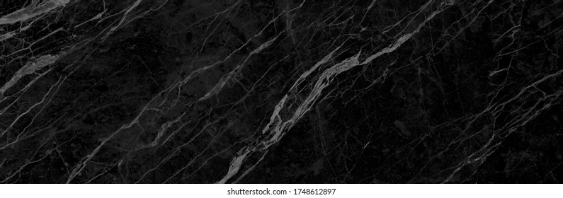 black marble floor and wall tile. black onyx marble texture background. black marble wallpaper and counter tops.  black marbel texture.  natural granite stone. abstract vintage marbel. 