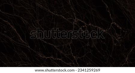 Black marble with golden vains ,luxurious black agent marble ,polished marble quartz stone background striped by natural with a unique pattering ,it can be used for interior-exterior home decor tiles.