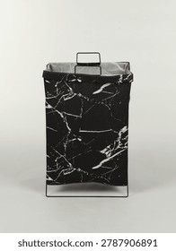 Black marble pattern laundry basket with metal frame isolated on white background