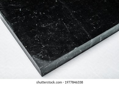 Black marble stone texture at different angles. Close-up. For decoration of premises
