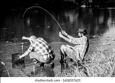 Black Market Caviar. Illegal Hunting Caviar. Extracts Eggs From Sturgeon Caught River. Trap For Fish. Men Sit At Riverside With Fishing Equipment. Poaching Crime And Fishing License. Poachers Fishing.