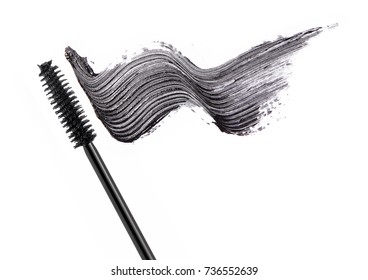 Black mascara brush stroke with applicator brush  isolated on white