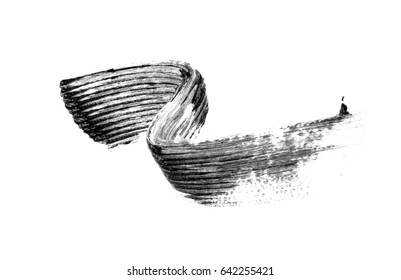 Black mascara brush strokes isolated on white