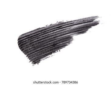 Black mascara brush strokes isolated on white