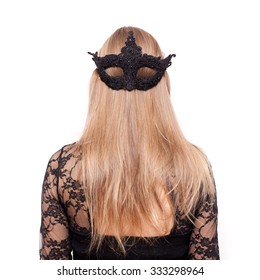 Black Mask On The Back Of The Head Of Young Blond Hair Woman. Mystery, Double Face, Secret. Metaphor Of Second Face And No Emotions. Poker Face.