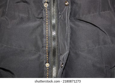 The Black Men's Jacket Texture. Black Coat Zipper Closure. Black Warm Seasonal Clothes.