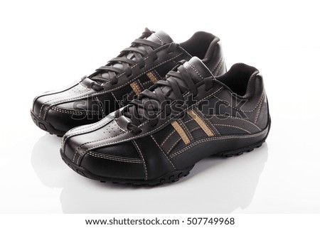 black men's shoes on a white background
