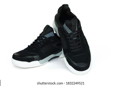 black sneakers with white soles