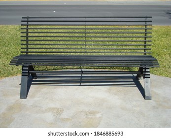 Black Metal Bench In Urban Park