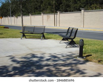 Black Metal Bench In Urban Park