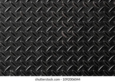 Black metal diamond plate pattern and background