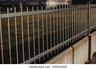 A Black Metal Fencing Around The Park