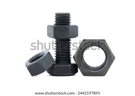 Black metal hexagonal bolt and nut shown in close-up isolated on white background