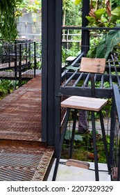 Black Metal Leg Bench In The Garden For Relaxation