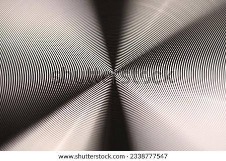 Black metal texture. Round metal texture. Metal texture background. Extrem close-up. High resolution photo. Full depth of field.