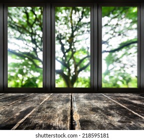 Black Metal Window Frame With Blur Tree Branch View  