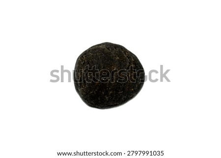 a black meteorite, solid piece of debris from an object, like a comet, asteroid, or meteoroid, that originates in outer space and survives its passage through the atmosphere to reach the surface of a planet
