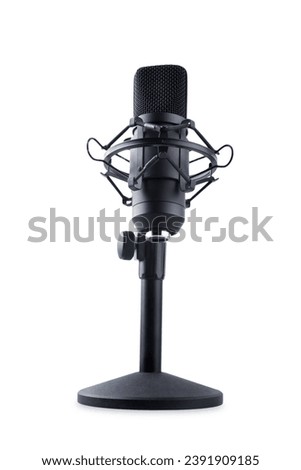 Black microphone on a white isolated background. 