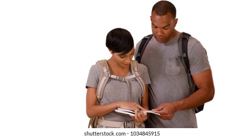 A Black Millennial Couple Plan Out Their Hike On A White Background