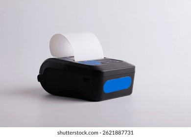 Black mini printer isolated on white background.