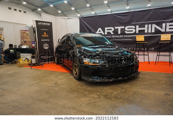 Black Mitsubishi Lancer Evolution on a display\
Jakarta Indonesia November 22nd\
2019