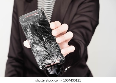 Black Mobile Phone Falling From The Floor And Broken Touch Screen