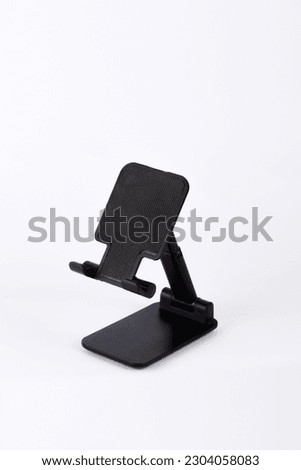 black mobile phone holder isolated on white background