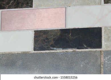 Black Mold Growing On Grout Lines On Tiled Shower Wall In Bathroom
