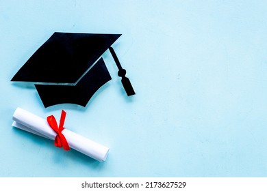 Black Mortarboard Graduation Cap Paper Cut With Diploma. Education Concept