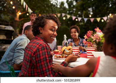 Black Mother And Son At Family 4th July Barbecue, Close Up