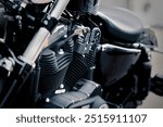 Black motorcycle engine with two V-cylinders