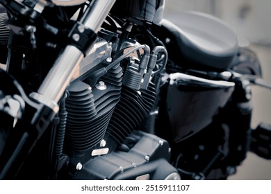 Black motorcycle engine with two V-cylinders - Powered by Shutterstock