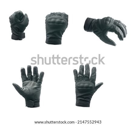 Black motorcycle gloves isolated on a white background.