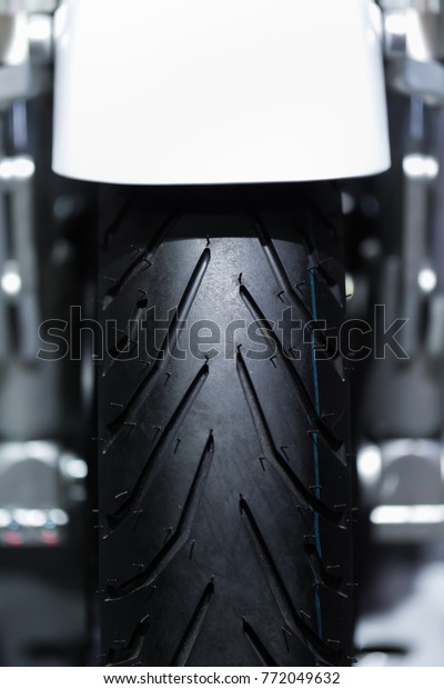 Black motorcycle\
tire.