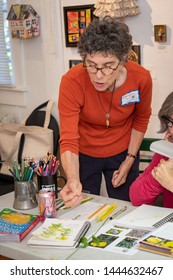 Black Mountain, NC /USA - June 14, 2019: Teacher Demonstrating To Students In An Art Class For Older Adults.