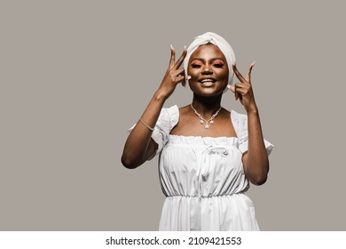 Black Muslim Woman Holding Up 2 Fingers Have Party. African Girl Is Celebrating Her Birthday And Having Fun.