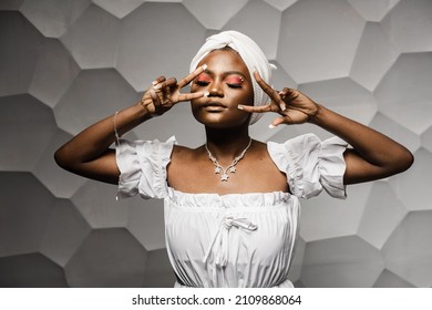 Black Muslim Woman Holding Up 2 Fingers Have Party. African Girl Is Celebrating Her Birthday And Having Fun.