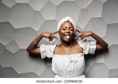 Black Muslim Woman Holding Up 2 Fingers Have Party. African Girl Is Celebrating Her Birthday And Having Fun,