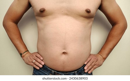 Black nipples, Close up view front of male body, male breasts, shirtless, abdominal distension, left right ribs, arms close to body, skin tone, Isolate on white bavkground and health care concept.