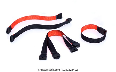 Black And Orange Fabric Ribbon Bracelet With Safety Breakaway Clasp. Isolated White Background