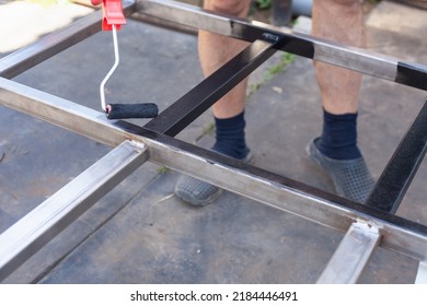 Black Paint Roller Paints The Metal Structure