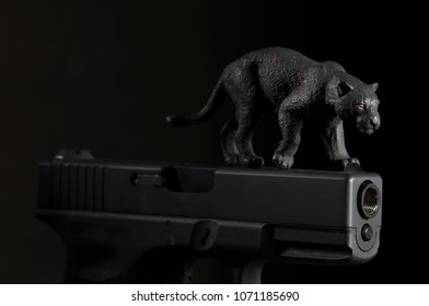 Black Panther Figure Walking On Gun