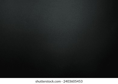 Black paper background with light for adding letters.