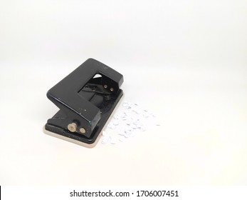 Black Paper Hole Punch, Office Tool Equipment With Confetti Isolated On White Background