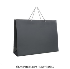 Black paper shopping bag isolated on white