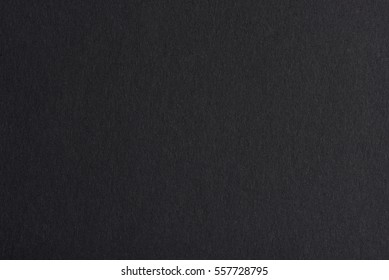 Black paper texture background. Black blank page - Shutterstock ID 557728795