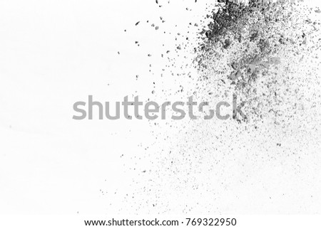 Black particles explosion isolated on white background. Abstract dust overlay texture. 